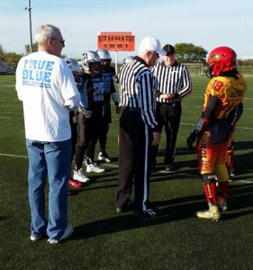 Brian Natell, father of #81 Maggie Natell, performed the coin toss